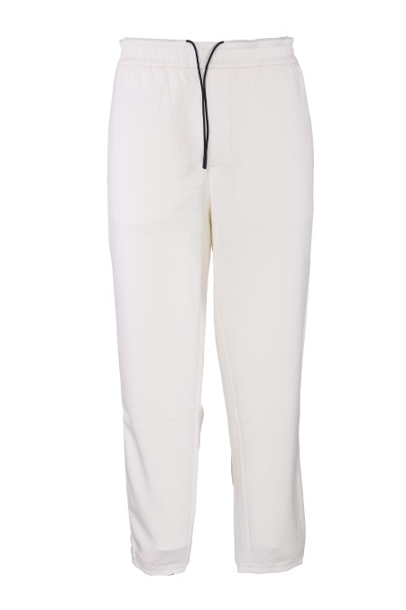 Shop EMPORIO ARMANI  Trousers: Emporio Armani Travel Essential double jersey jogger trousers.
Double jersey.
Elastic waist with drawstring.
Side welt pockets.
Tonal thin side bands.
Rear welt pockets.
Collector's patch on the back.
Composition: 48% Polyester, 46% Modal, 6% Elastane.
Made in Cambodia.. EM000084 AF10103-U1105
